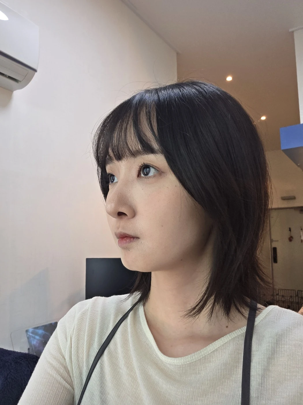 Eyelid surgery: three-month recovery and an asymmetry concern · Case 087 at Answer Plastic Surgery. Oblique view — 2 months after surgery, eyelid surgery at Answer Plastic Surgery (case 087).