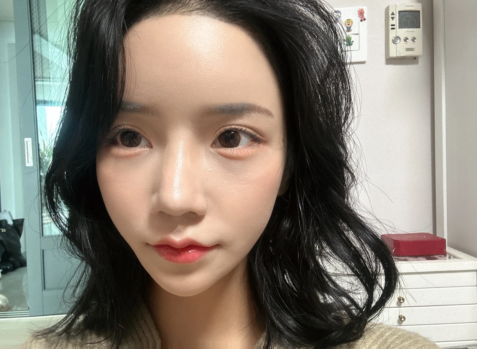 Rhinoplasty and eye surgery: a two-month photo diary · Case 024 at Answer Plastic Surgery. Front-facing view during early recovery — 1 week at Answer Plastic Surgery.
