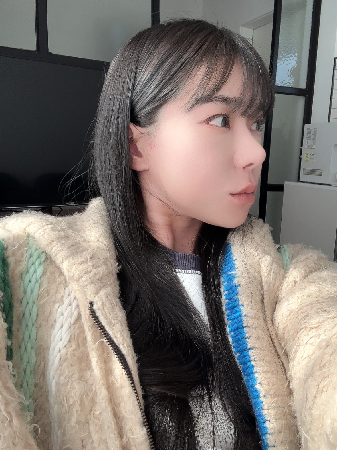 Inner-corner and Wonder eye surgery: the first two weeks · Case 039 at Answer Plastic Surgery. Oblique portrait — 2 weeks after surgery at Answer Plastic Surgery.